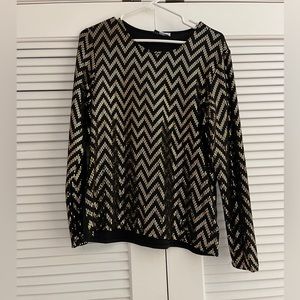 C’EST LA VIE, long sleeve shirt, size large. It’s black with gold sequence.